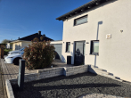 Außenaufnahme - Modernes Familienglück in ruhiger Lage – energieeffizientes Einfamilienhaus mit Garten, Smart Home und Doppelgarage