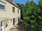 Aussenansicht - Charmantes Reihenendhaus mit Entwicklungspotenzial in Seenähe – Wohnen am Geiseltalsee