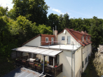Terrasse (DG)+ Balkon (Whg.III OG) - Wohnen im Grünen – Vielseitiges Mehrfamilienhaus mit Scheune, Stallung und großem Grundstück im idyllischen Südharz