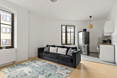 Wohnzimmer mit offener Küche - Möblierte 2-Raumwohnung in der Freiimfelder Straße!