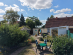 Garten - Gepflegte Doppelhaushälfte mit Wintergarten in attraktiver Lage von Halle-Dautzsch