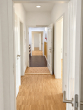 Flur - Exklusiver Wohnkomfort auf 71 m² – zwei Balkone, Parkett, Fußbodenheizung und Aufzug
