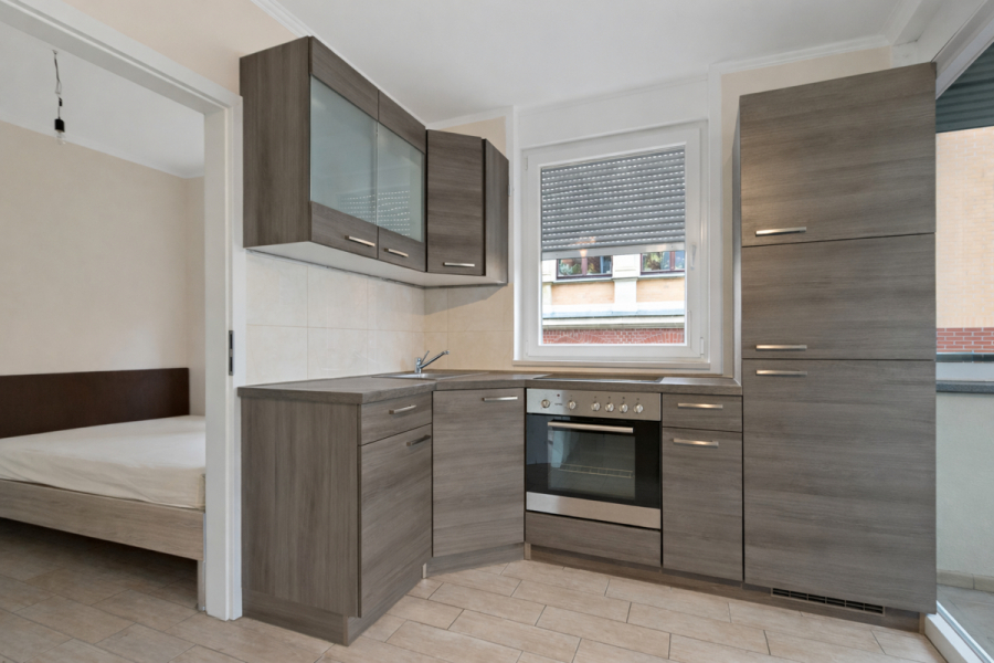 Schöne 2-Raumwohnung mit Einbauküche, Balkon und Fahrstuhl im Mühlwegviertel! - Photo 4