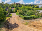 Außenaufnahme - Traumgrundstück in Seeburg – genehmigte Bauvoranfrage für Wohnbebauung & unverbaubarer Seeblick!
