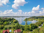 Außenaufnahme - Traumgrundstück in Seeburg – genehmigte Bauvoranfrage für Wohnbebauung & unverbaubarer Seeblick!