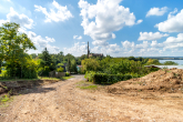 Außenaufnahme - Traumgrundstück in Seeburg – genehmigte Bauvoranfrage für Wohnbebauung & unverbaubarer Seeblick!