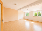 Wohnzimmer - Wohnen zwischen Stadt und Natur – großzügige Dachgeschosswohnung in Heide-Süd