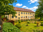 Hausansicht - Wohnen zwischen Stadt und Natur – großzügige Dachgeschosswohnung in Heide-Süd