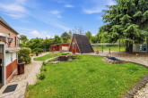 Außenbereich 1 - Familienidylle in Wallwitz – Gepflegtes Einfamilienhaus mit Wintergarten, Teich und gepflegten Garten