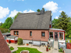 Hausansicht 4 - Familienidylle in Wallwitz – Gepflegtes Einfamilienhaus mit Wintergarten, Teich und gepflegten Garten