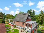 Hausansicht 2 - Familienidylle in Wallwitz – Gepflegtes Einfamilienhaus mit Wintergarten, Teich und gepflegten Garten