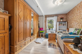 Schlafzimmer 1.OG - Familienidylle in Wallwitz – Gepflegtes Einfamilienhaus mit Wintergarten, Teich und gepflegten Garten
