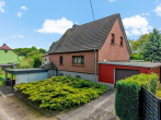 Hausansicht 3 - Familienidylle in Wallwitz – Gepflegtes Einfamilienhaus mit Wintergarten, Teich und gepflegten Garten