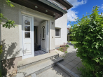 Hauseingang - “Schollehaus” gesucht? Reihenendhaus mit kleinem Garten und Garage
